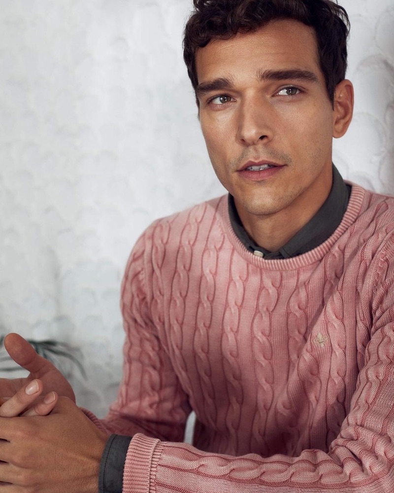 Donning a cable-knit sweater, Alexandre Cunha fronts Morris Stockholm's spring-summer 2019 campaign.
