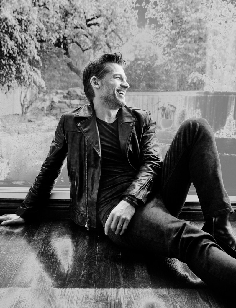 All smiles, Nikolaj Coster-Waldau rocks a leather biker jacket for the pages of Man About Town.