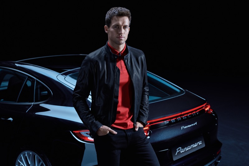 Embracing a racer-chic look, Andrew Cooper dons clothing from the Porsche x BOSS capsule collection.