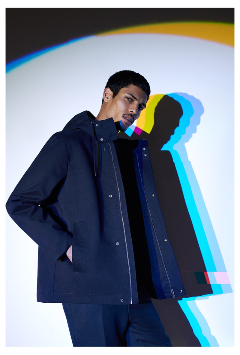 Sporting a navy parka, Geron McKinley models Reserved.