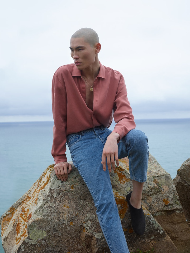 Embracing smart casual style, Jean Chang wears a shirt and jeans from Reserved's Re.Design collection.