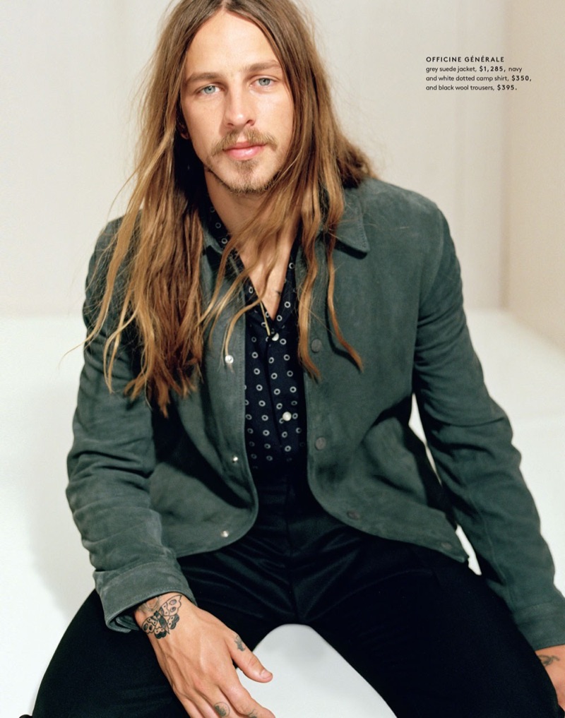 Riley Hawk wears a suede jacket, camp shirt, and wool trousers by Officine Generale.