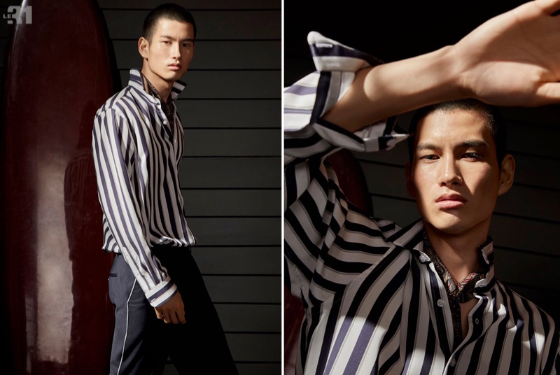 Donning a striped shirt by LE 31, Kohei Takabatake also wears a paisley scarf and piped pants from the brand.