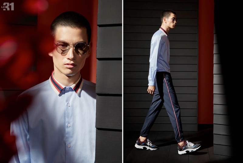 Reuniting with Simons, Kohei Takabatake models a LE 31 shirt, joggers, and Carrera round sunglasses.