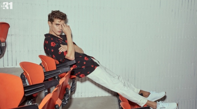 Garden of Arcadia: Jordy Baan & Simon Malenfant Don Floral Prints for Simons Connecting with Simons, Jordy Baan sports a rose print camp shirt from LE 31 with Reebok Classic sneakers.