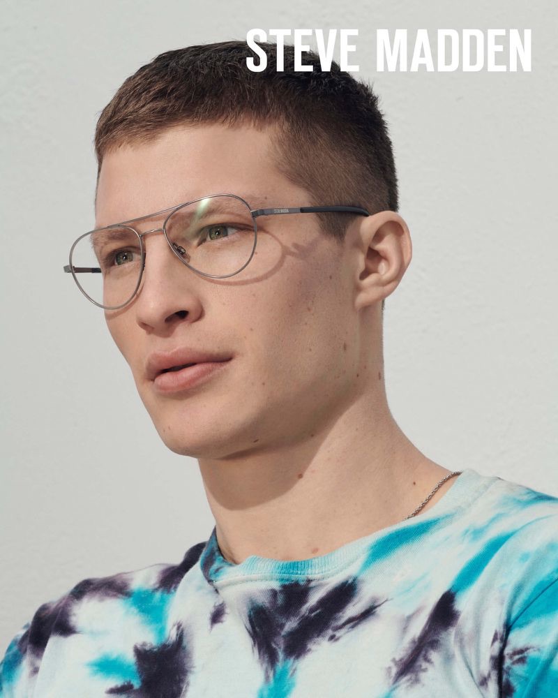 A smart vision, Jordan Paris dons glasses for Steve Madden's summer 2019 campaign.