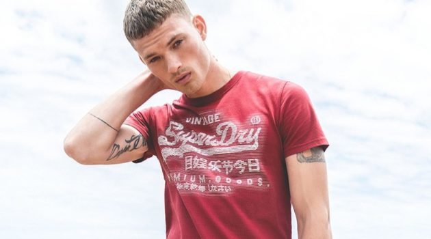 William Los & Ashton Gohil Sport Spring '19 Fashions by Superdry William Los sports a graphic tee from Superdry's spring-summer 2019 collection.