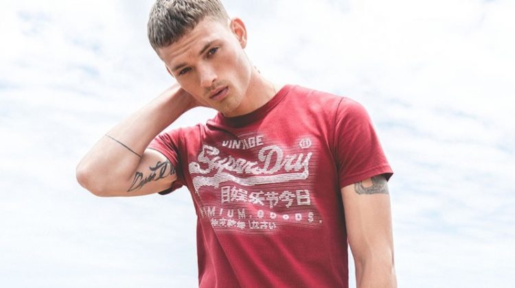 William Los sports a graphic tee from Superdry's spring-summer 2019 collection.