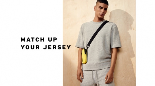 Short Supply: Zakaria Khiare Models Topman Shorts Making a case for grey, Zakaria Khiare sports a Topman toweling sweatshirt and shorts.