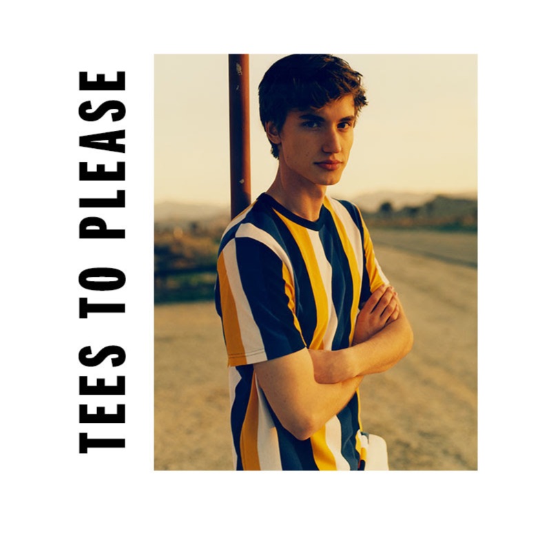 Ivan Vuckovic sports a yellow and blue striped t-shirt by Topman.