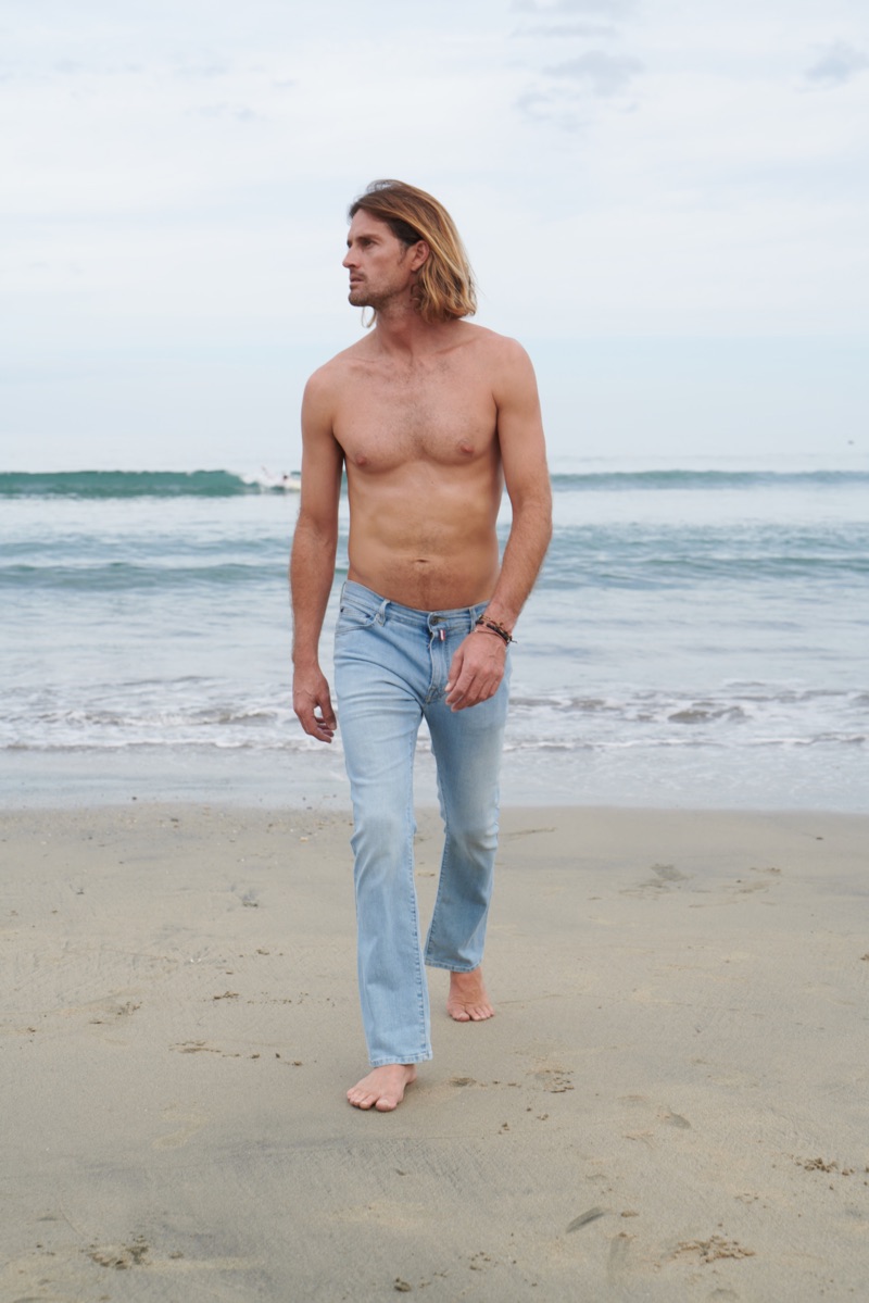 Taking to the beach, Ryan Heavyside wears Vilebrequin's men 70s flare jeans.