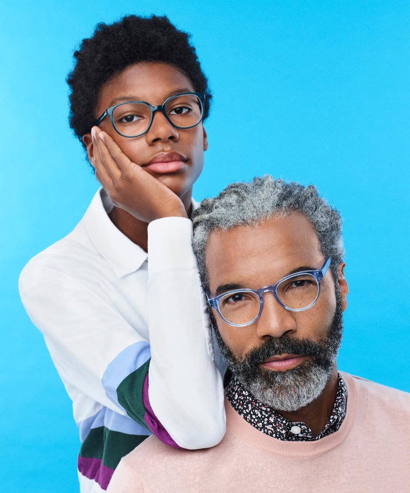 Silas sits for a photo with his father Daryl. Silas wears Warby Parker's Eugene glasses, while Daryl sports the brand's Percey style.