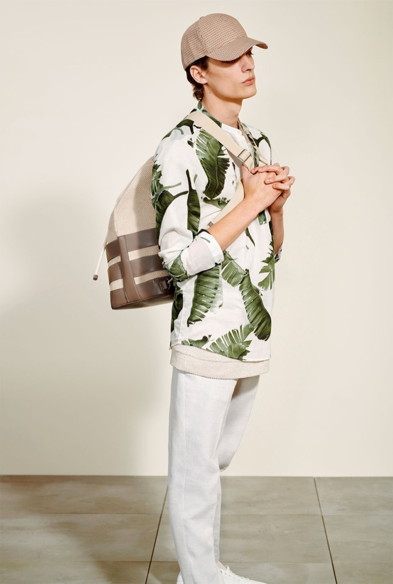 Making a statement, Valentin Caron dons a botanical print from Zara Man.