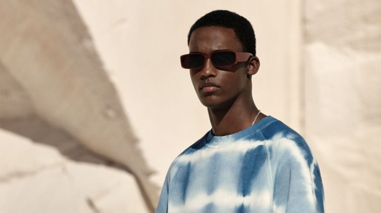 Mahad Musse dons a tie-dye short-sleeve sweatshirt from Zara.