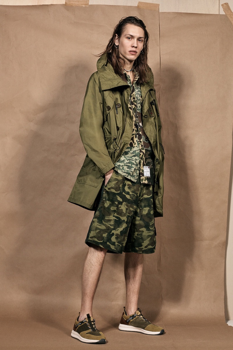 Sebastian Åhman sports a parka and camouflage-print fashions from the Zara SRPLS collection.