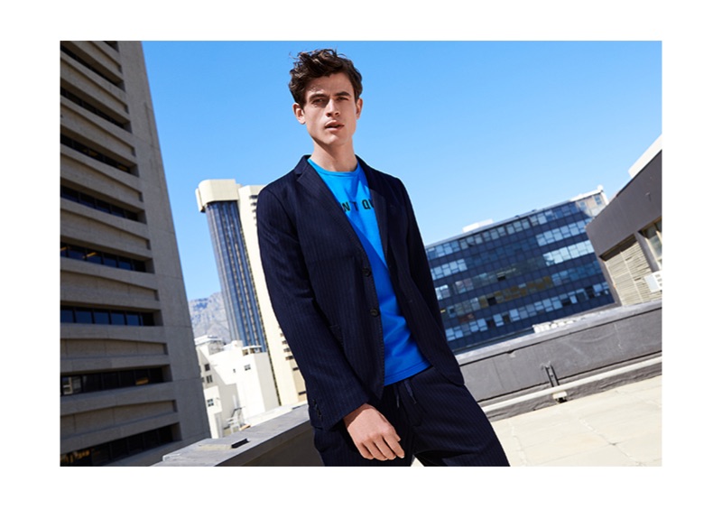 Model Luc van Geffen dons a s.Oliver Black Label suiting look inspired by the athlete.