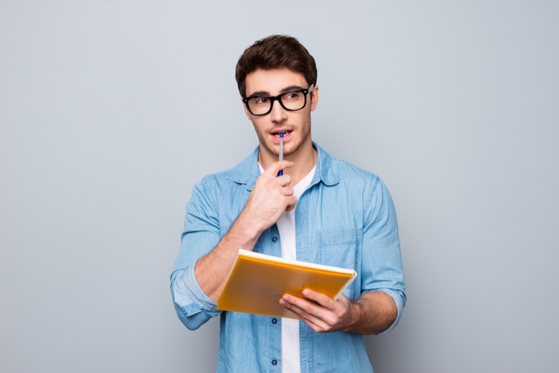 Attractive Man Glasses Paper Thinking Attractive Man Glasses Paper Thinking
