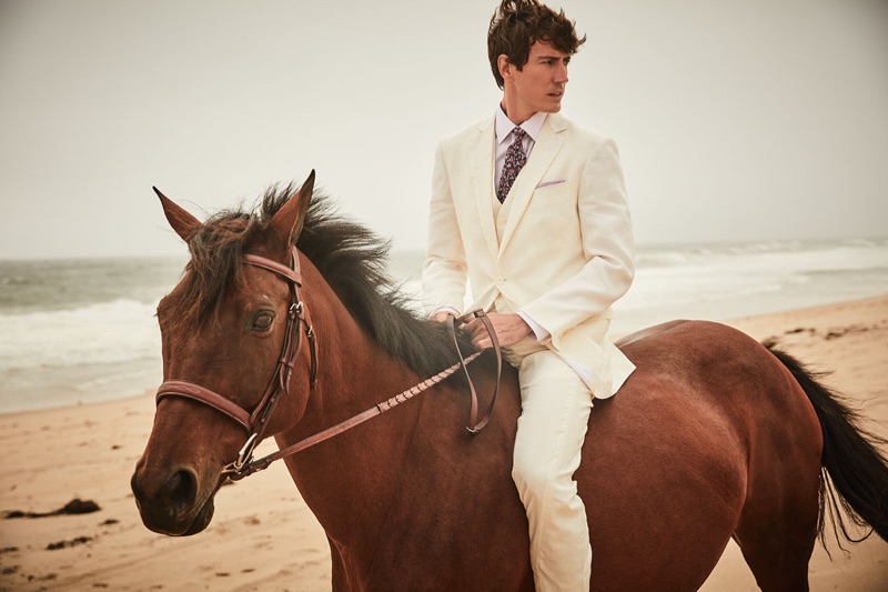 Riding a horse, Oriol Elcacho appears in Brooks Brothers' summer 2019 campaign.