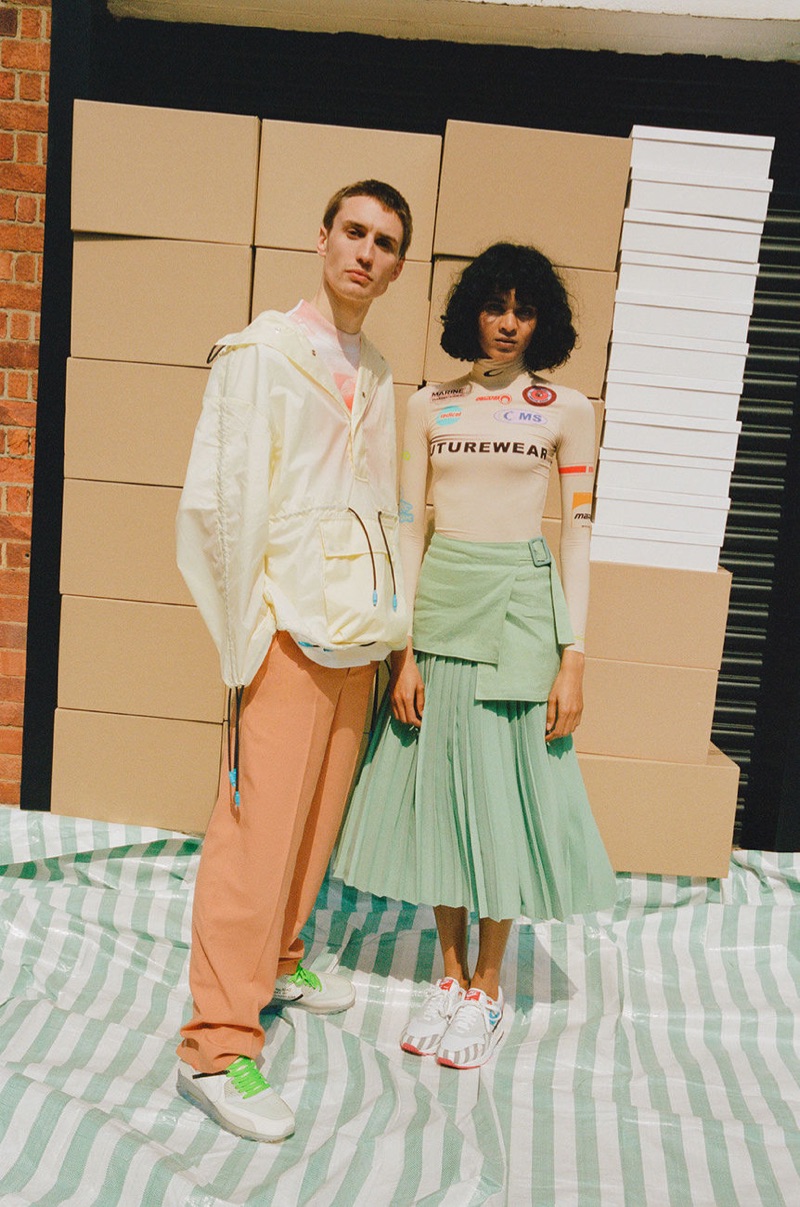 Embracing summer hues, Michael Sharp dons a Jil Sander t-shirt, Sunnei jacket, Burberry trousers, and sneakers from Stadium Goods.