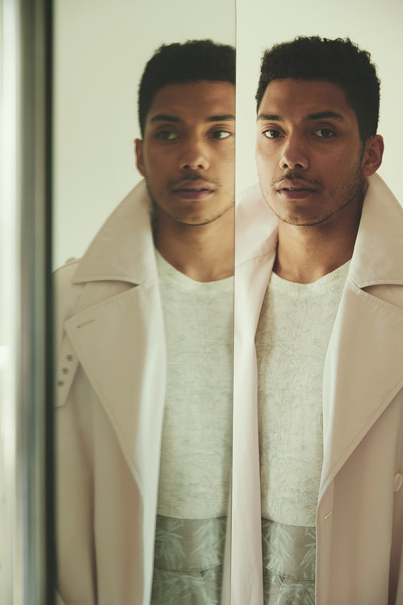 Front and center, Chance Perdomo sports a Hugo Boss trench coat with a sweater and pants by Etro.