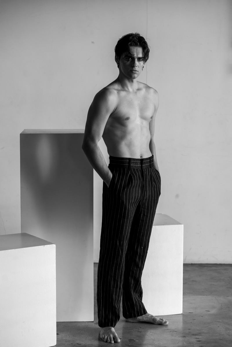 Jakub wears striped trousers Chris Diaz.