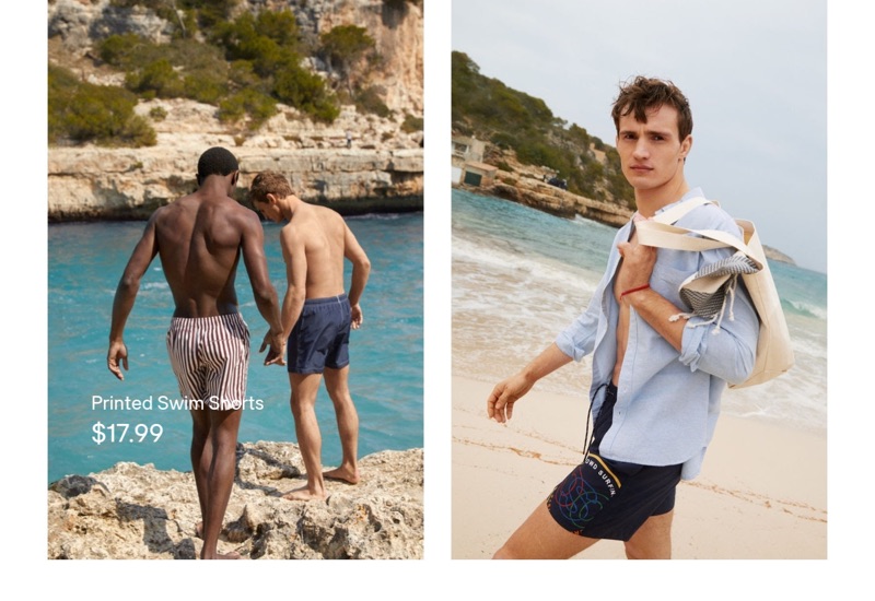 Taking to the beach, Hamid Onifade and Julian Schneyder wear H&M swim shorts.