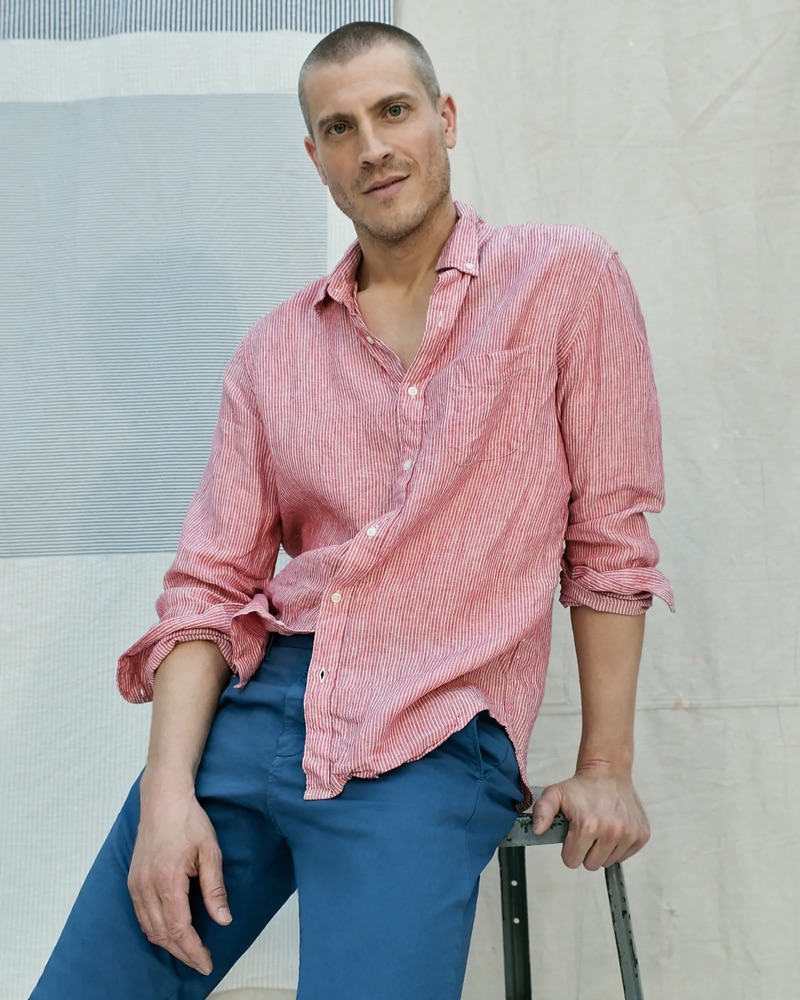 A relaxed vision, Mike Guenther dons a red Baird McNutt Irish linen shirt, J.Crew 770 straight-fit garment-dyed chinos, and Pro-Keds Royal Lo sneakers.