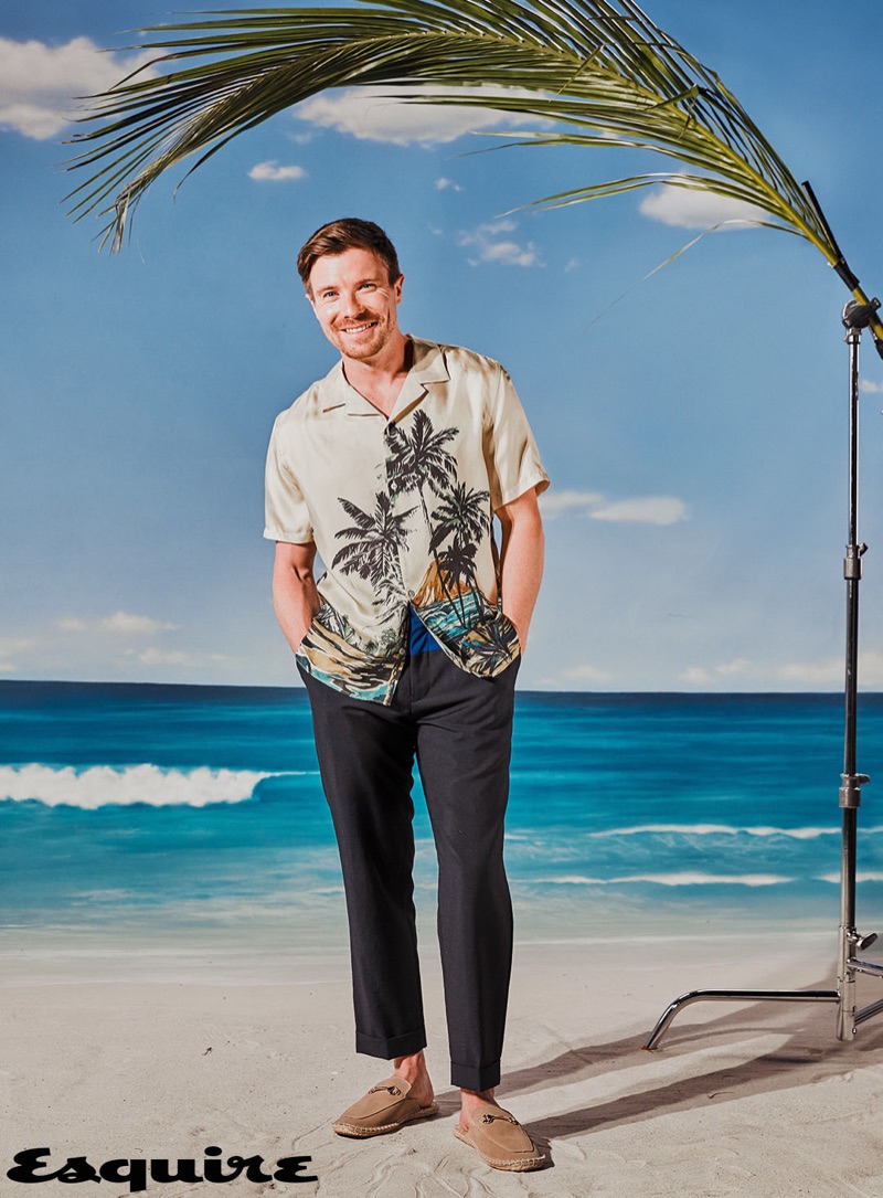 Embracing summer style, Joe Dempsie sports a shirt by The Kooples with Tommy Hilfiger trousers, and ASOS loafers.