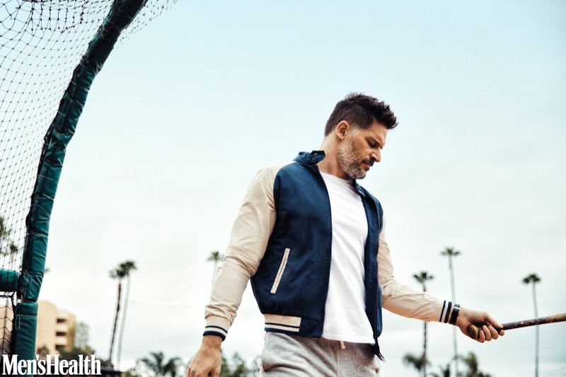 Connecting with Men's Health, Joe Manganiello sports a Ben Sherman jacket, Calvin Klein t-shirt, Todd Snyder + Champion sweatpants, and a Movado watch.