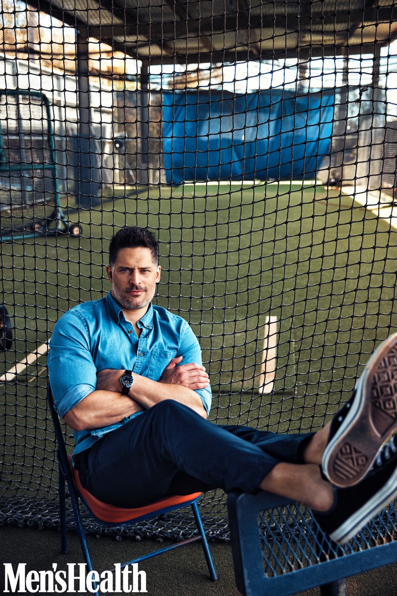 Starring in a new photo shoot, Joe Manganiello wears an Old Navy shirt, Save khaki pants, Converse sneakers, and a Movado watch.