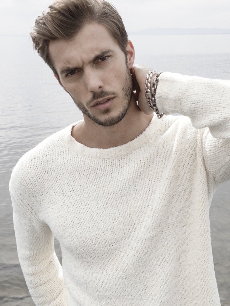 Reuniting with John Varvatos, Federico Cola wears an easy fit crewneck sweater $398 from the brand's Collection line.