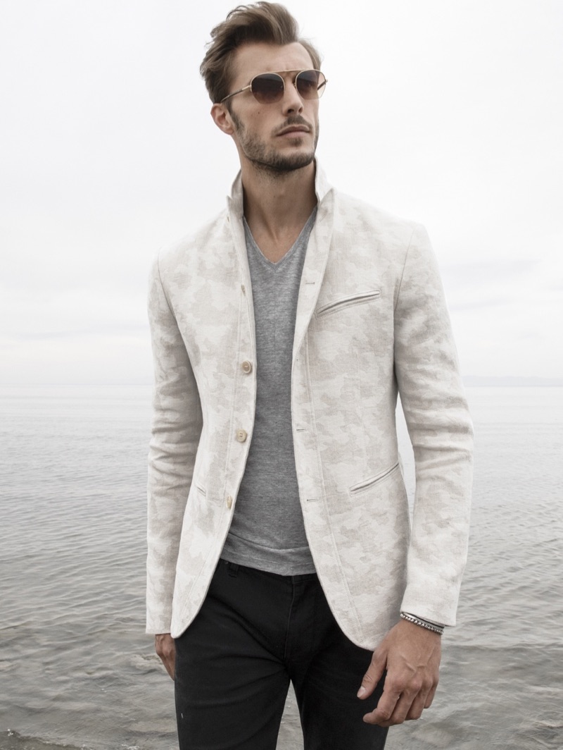A chic vision, Federico Cola dons a John Varvatos Collection camo jacquard jacket $1,298.
