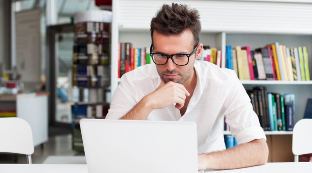 Top 9 Strategies for Starting a Successful Online E-Commerce Company Man Working on Laptop