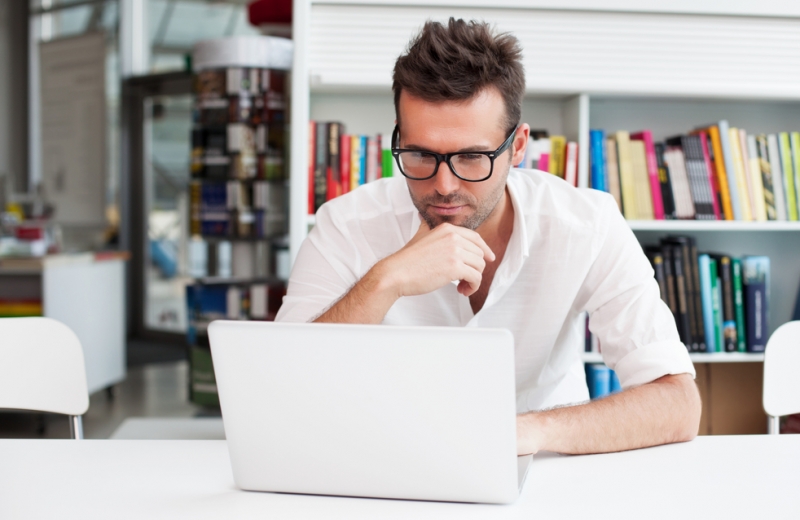 Top 9 Strategies for Starting a Successful Online E-Commerce Company Man Working on Laptop