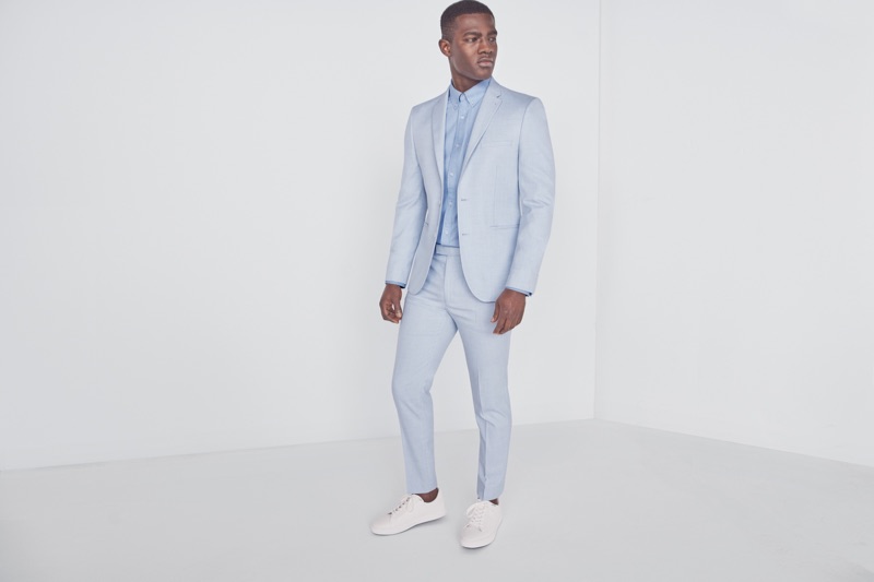 Kesse Donkor wears summer suiting from Marks & Spencer.