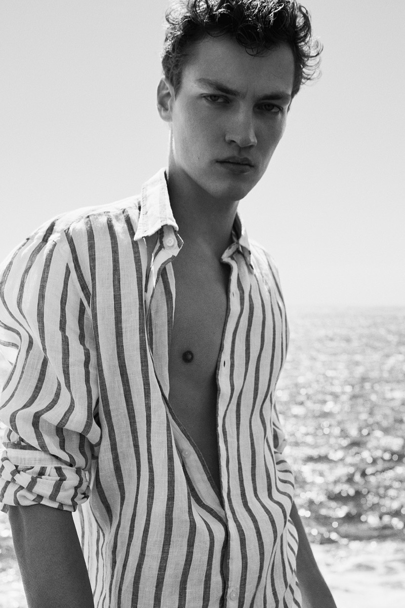 Swann Guerrault sports a striped shirt for Massimo Dutti's summer 2019 campaign.