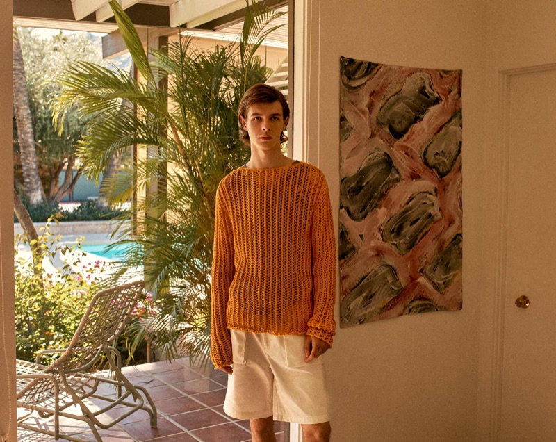 Efraim Schröder dons a Jacquemus sweater with a Marrakshi tank and P. Johnson shorts.