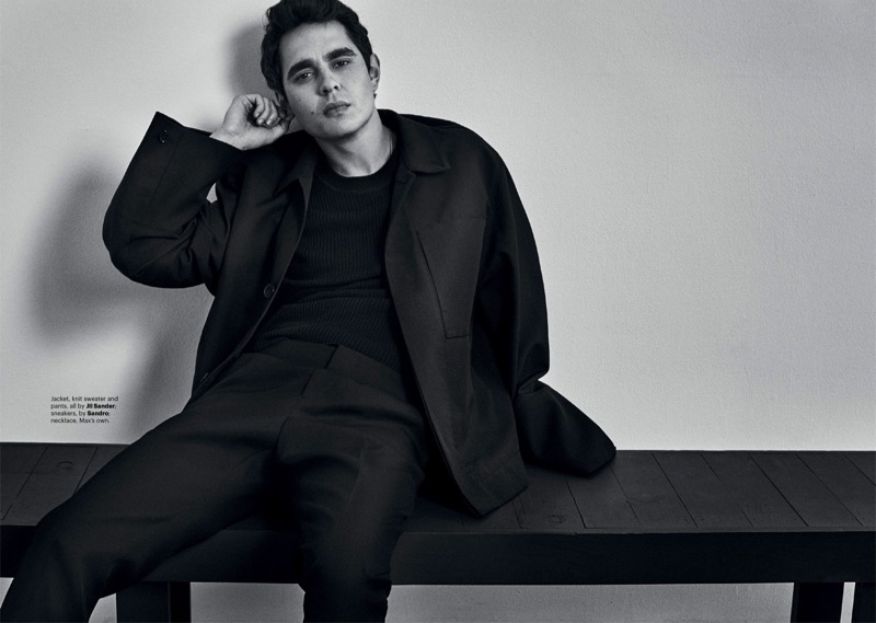 Actor Max Minghella wears a jacket, sweater, and pants by Jil Sander.