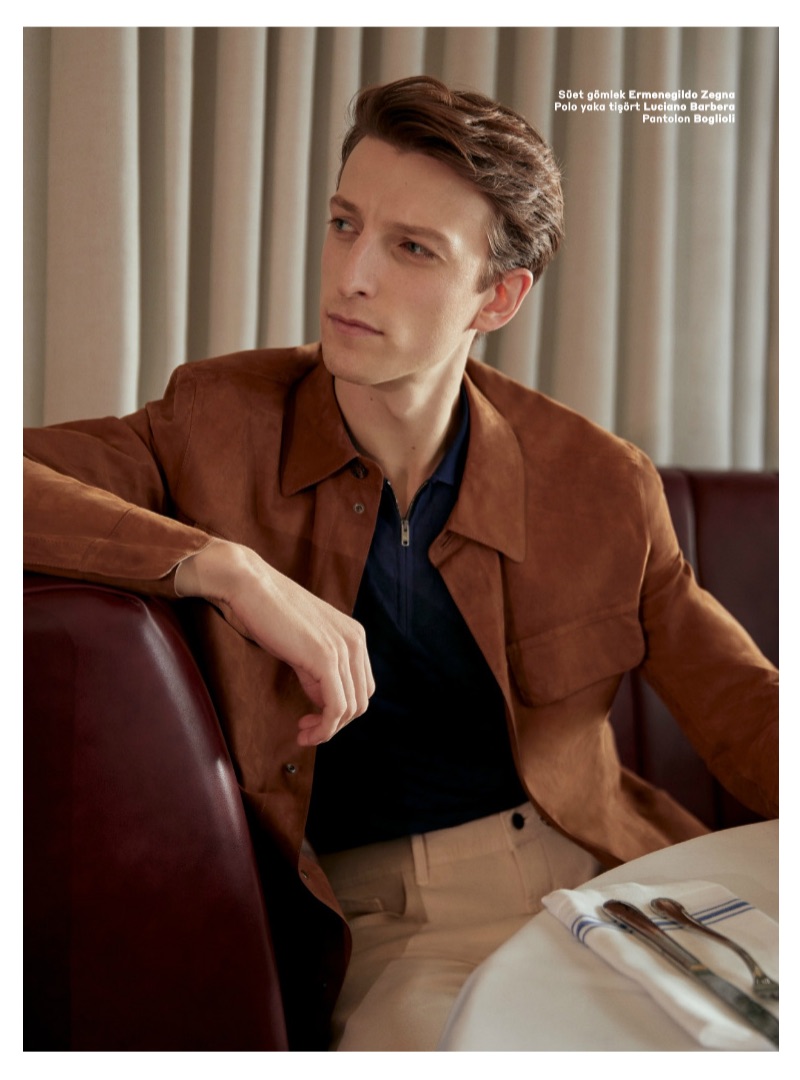 Max Townsend dons an Ermenegildo Zegna suede jacket with a Luciano Barbera half-zip polo and Boglioli pants.