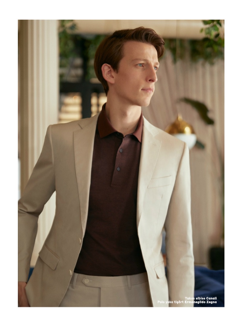 Embracing neutrals, Max Townsend models a Canali suit with an Ermenegildo Zegna polo.