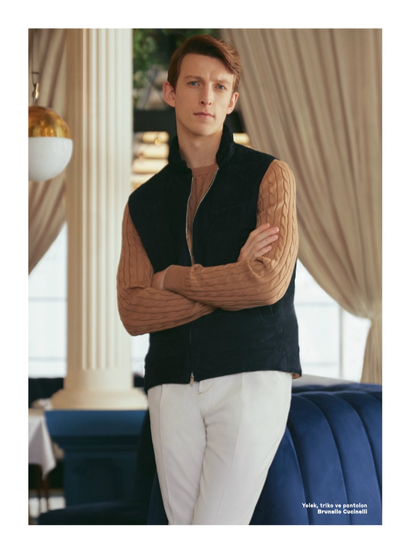 Front and center, Max Townsend wears a look from Brunello Cucinelli.