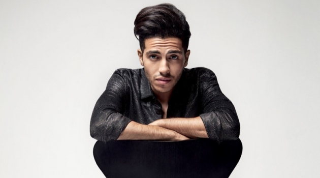 Mena Massoud Covers Esquire Middle East, Talks 'Aladdin' Actor Mena Massoud wears a glitter shirt, pinstripe trousers, and printed dress shoes by Saint Laurent.