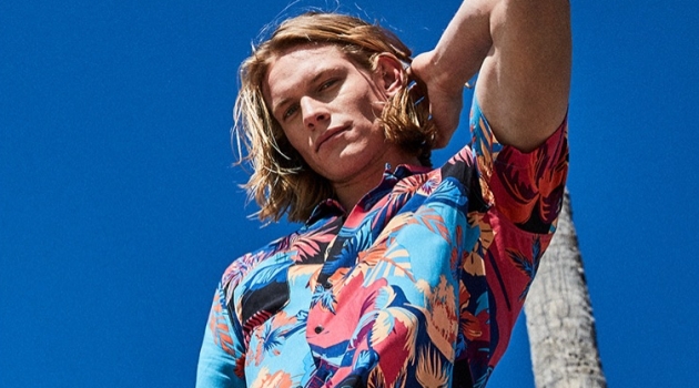 Macy's Makes a Case for Graphic Camp Collar Shirts Ready for summer, Hunter Bach sports an American Rag men's tropical dual pocket shirt $40.