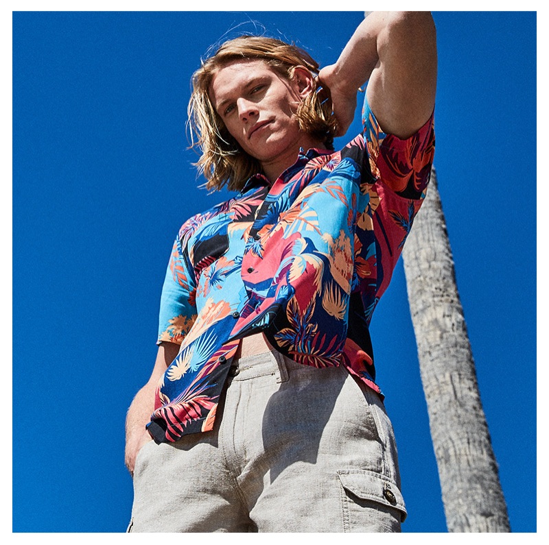 Ready for summer, Hunter Bach sports an American Rag men's tropical dual pocket shirt $40.