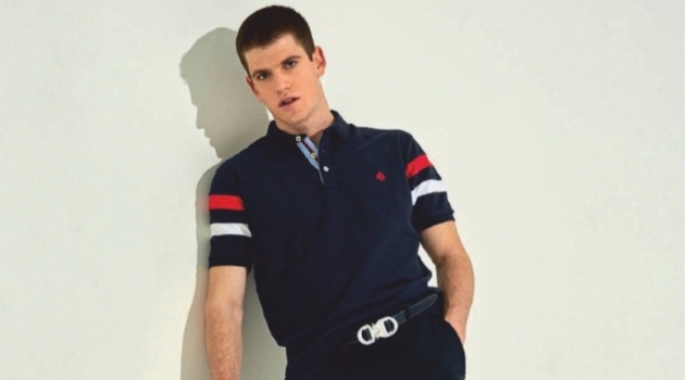Miguel Bernardeau Sports Springfield for Esquire España, Talks 'Elite' Striking a pose, Miguel Bernardeau wears a Springfield polo with a belt and pants by Dior Men. He also sports Calvin Klein Jeans shoes.