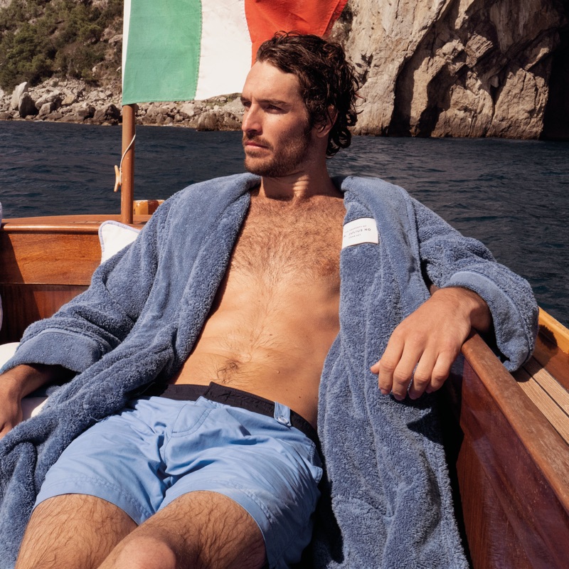 Lounging, Justice Joslin wears an Orlebar Brown Dr No toweling robe $475.
