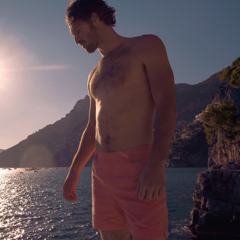 Wearing a shade of pink, Justice Joslin rocks a pair of Thunderball Day shorts $295 from Orlebar Brown's 007 collection.