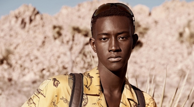 Oumar Diouf Hikes into Desert for Elle Men China