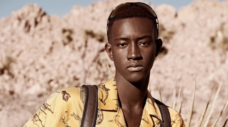 Oumar Diouf Hikes into Desert for Elle Men China