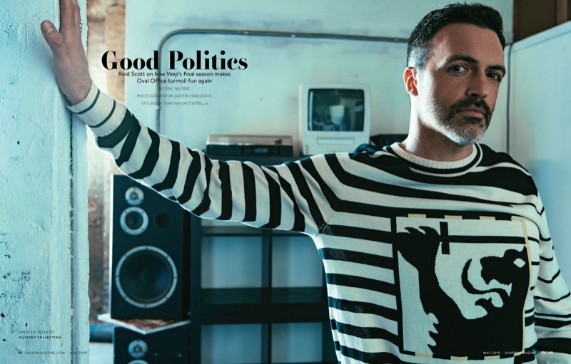 Reid Scott wears a striped sweater from Hilfiger Collection.